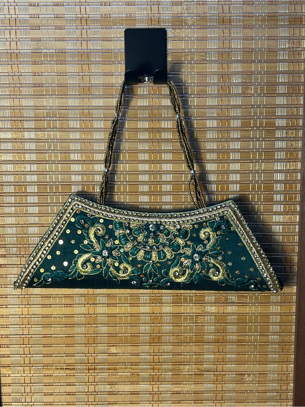 Green Clutch with Gold Accents & shimmer embroidered design. Beaded handles.